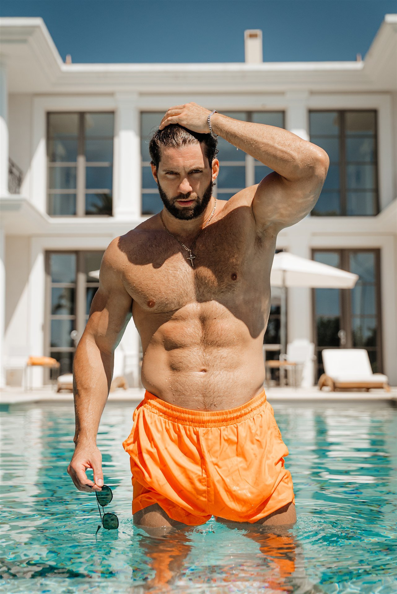 Florian Munteanu at a pool in Cannes