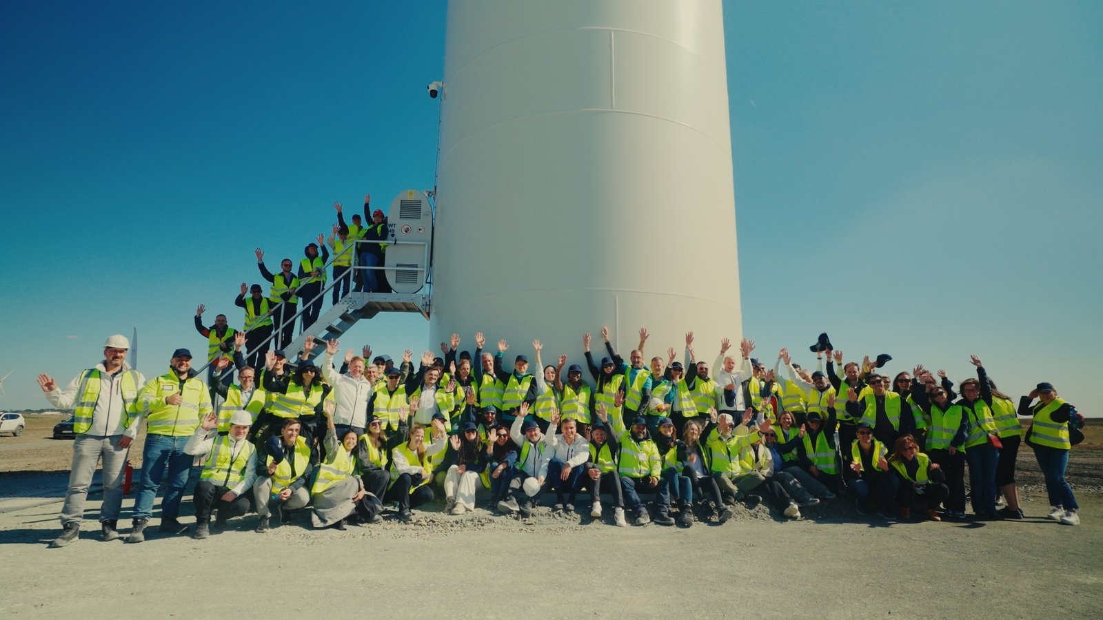 Rezolv Energy team at a wind turbine opening